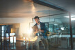 © peopleimages.com - Reading, glass office and businessman on tablet at night for research project, online news and internet. Professional, startup and worker on digital tech working late for planning, website and email