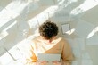 © Ryzhkov - Young Adult Immersed in Digital Devices Among Scattered Papers in Sunlit Room