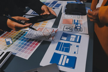 The designer team is designing the uxui system to make the uxui system work well on new phones and support system updates. Website development concept UI UX front end designer