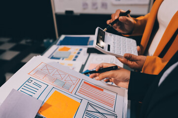 The designer team is designing the uxui system to make the uxui system work well on new phones and support system updates. Website development concept UI UX front end designer