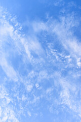 Wall Mural - beautiful blue sky and white fluffy group of clouds with sunrise in the morning, natural background
