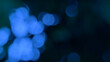 © mineart1995 - Abstract image of blurred blue lights against a dark background. Dark bokeh photo with blurred light, Background for banner.