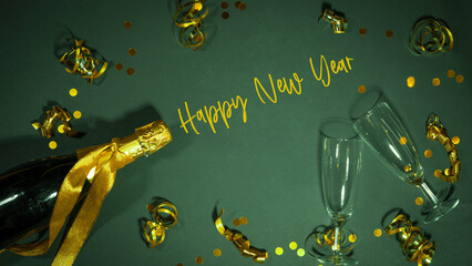 HAPPY NEW YEAR 2025 Silvester Sylvester New Year's eve greeting card with text - Golden champagne bottle, champagne or sparkling wine glasses and ribbons, isolated on green table background, flat lay