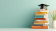 © Worakit - vibrant stack of textbooks topped with graduation cap symbolizes academic achievement and success. This evokes sense of accomplishment and inspiration for students