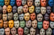 © Gatherina - Colorful masks hanging on a dark wooden wall representing diverse human emotions