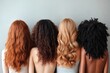 © Gatherina - Four diverse women showing their beautiful long hair from behind