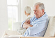 © peopleimages.com - Old man, couple conflict and silence in home, toxic relationship and frustration with wife. People, fight and ignore woman in living room for mistake or marriage fail, divorce and drama of betrayal