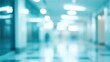© hassan - Abstract blurred hospital interior background with defocused medical hallway, bright lights, and modern healthcare facility design for medical and health industry concepts