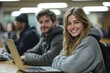 © Outkast - Smiling Female Student with a Laptop and a Smiley Face Patch on Her Hoodie