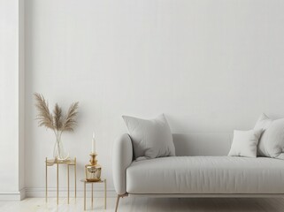 Minimalist living room with a white sofa. two gold end tables. a vase of dried pampas grass. and a candle holder