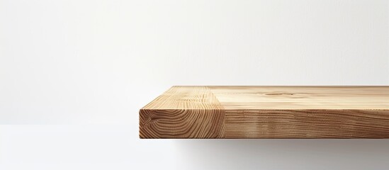 Wall Mural - an angle of a wooden table corner captured on a white backdrop with ample space for additional graph