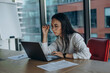 © sashafolly - Female financial analysist controls commercial data at workplace