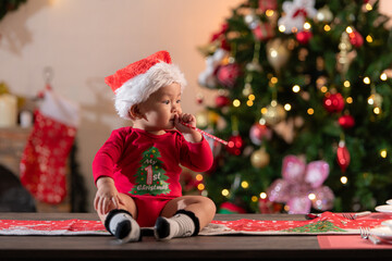 Portrait of little boy in Christmas costume on Christmas night