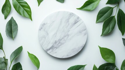 Above view of a marble pedestal with leaves suitable for showcasing natural cosmetics Ideal nature backdrop for luxury product presentation