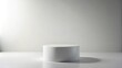 © Kingphet - Minimalist white background with sleek pedestal