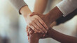 © forenna - Teamwork and Unity in Modern Office Huddle
