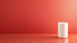 © Arumboy - Minimalist white cup against soft coral background, creating serene atmosphere