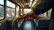 © taezhniya31 - man holding onto handrail on bus during rush hour