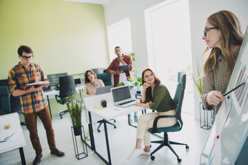 Photo of smiling thoughtful students enjoying business school studying listening important conference indoors workplace workstation