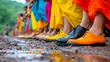 © A4719 - Colorful Saris and Footwear on Muddy Ground in India