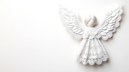 White angel figure with lace wings, white isolated background.