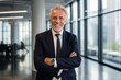 © CojanAI - Smiling portrait of a senior Caucasian businessman in modern office