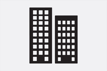 A black silhouette  vector of two city buildings.