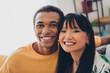 © deagreez - Photo of cheerful cute funny multinational couple enjoying time together flat apartment indoors
