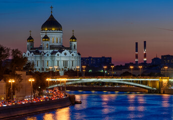 Wall Mural - sunset view of cathedral of christ the savior and moscow river in moscow, russia. architecture and l