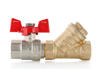 Metal ball valve with a coarse filter, with a red handle on a white background. Full depth of field.