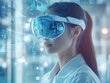 © DudeDesignStudio - A young woman wearing a VR headset, looking at a digital interface.