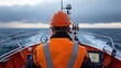 © MarkFinal - Maritime Worker Navigating on a Rescue Boat