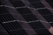 © farmuty - Abstract close-up of solar panels arranged in a diagonal pattern, showcasing clean energy technology and renewable energy themes.