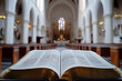 © AungThurein - An open bible book in a church with relevant background