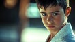 © AbstractAI - A young karate practitioner showcasing a focused expression that reflects the dedication and discipline inherent in martial arts training
