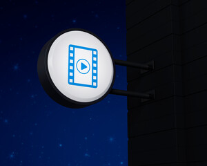 Play button with movie icon on hanging black rounded signboard over fantasy night sky, Business cinema online concept, 3D rendering