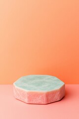 Poster - Elegant octagonal object on a soft coral background a minimalist aesthetic statement