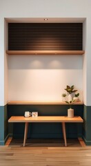 Minimalist wooden shelf with two shelves against a teal wall and a white background,  with a wooden bench underneath.