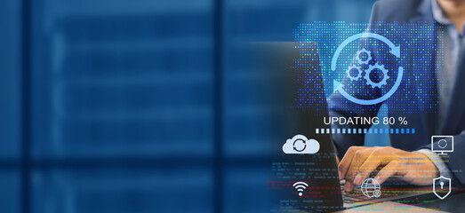 A business person updates software, installs an update process, and upgrades the software version concept. Software updates or operating system upgrades