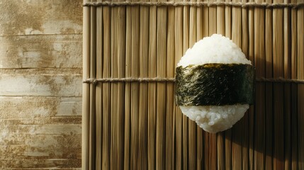 Poster - Delicious Rice Ball Wrapped in Seaweed on a Mat