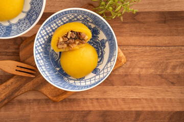 Wall Mural - Sweet potato yam bun with ground pork meat, mushroom and chopped bamboo shoot fillings inside.