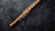 © Александр Лобач - A golden classical musical instrument is a flute on a black background. A series of musical instruments