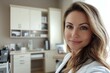 © Bold24 - a selfie of a woman dermatologist, background her office.