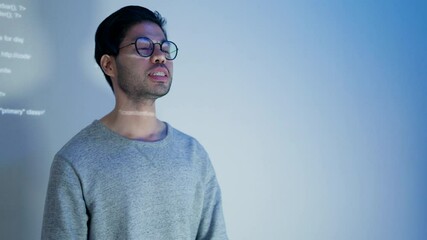 Wall Mural - an asian male tech specialist passionately explaining a coding project during a team meeting. the im
