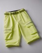 © Viktor Petrushenko - Bright yellow cargo shorts with a decorative belt, perfect for summer adventures.