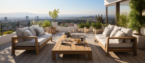 A serene outdoor lounge area with comfortable seating and a view of the city.