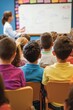 © Oscar - Classroom filled with diverse students attentively watching a teacher explaining a concept on a whiteboard,