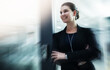 © peopleimages.com - Businesswoman, blur or thinking with smile at door for company ideas, vision or future growth. Employer, motion or happy hr manager with confidence, arms crossed or insight for leadership in office