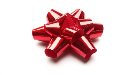 Bright red gift bow prominently displayed on a white background, symbolizing celebration and giving. Festive decoration.