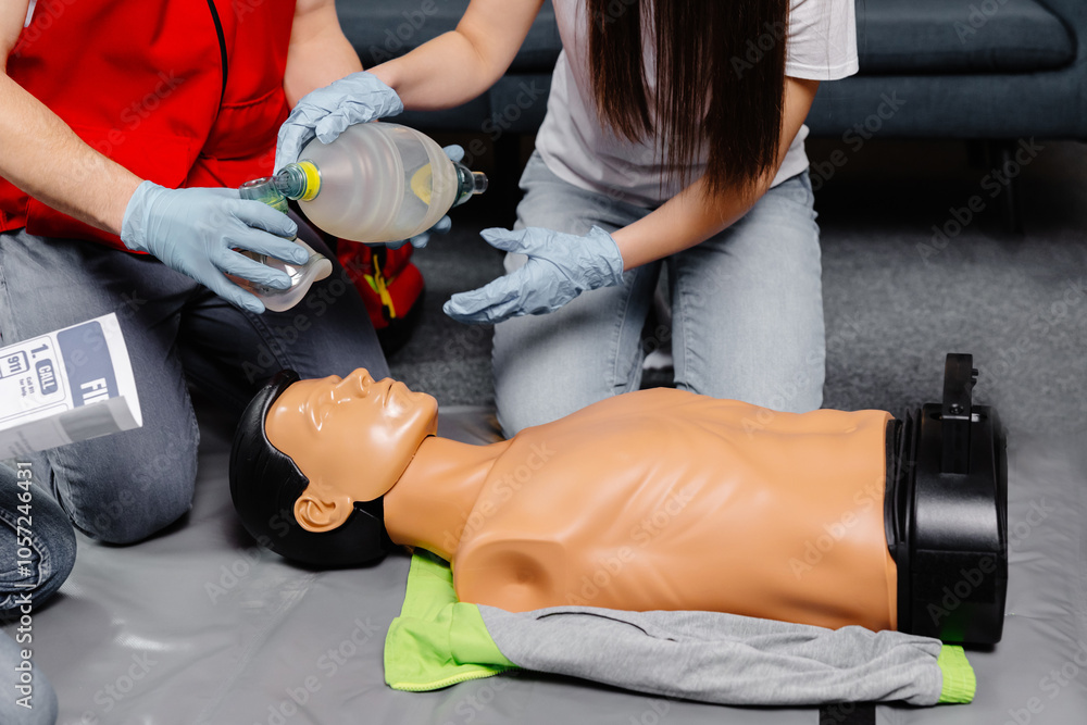 Woman holding breathing bag Ambu bag.Demonstrating CPR Cardiopulmonary ...